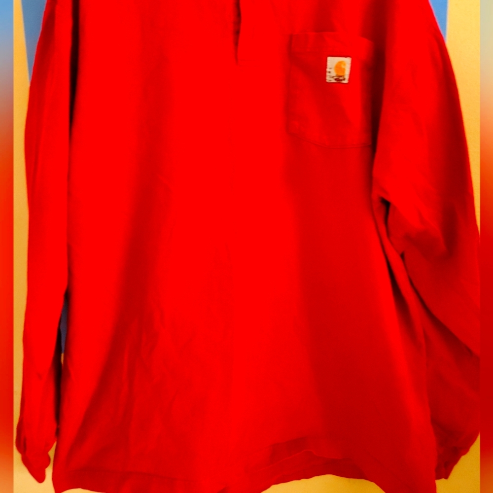 Red Carhartt long sleeve shirt. Large Tall size. Comfortable and durable.